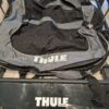 Thule Canyon XT Roof Basket Black 859002859XT with Cargo Net & Cargo Bag (5) Thule Canyon XT Roof Basket Black 859002/859XT with Cargo Net & Cargo Bag